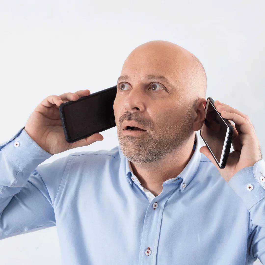 Business owner managing customer messages in WhatsApp Business with a second phone number